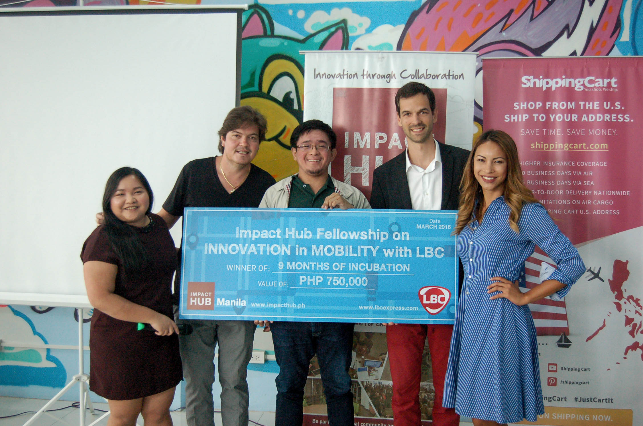 UP IN THE CLOUDS. SkyEye, Inc. Founder Matthew Cua (center) is all smiles as he receives his PhP750,000 prize from LBC Chief Innovation Officer Dino Araneta (2nd from left), and Impact Hub Co-founders Ces Rondario, (leftmost), Matthias Jaeggi (2nd from right), and LizAn Kuster (rightmost)